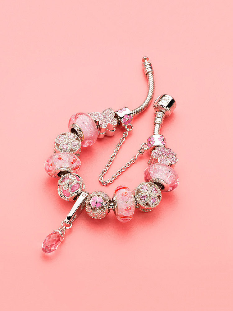 Bracelet look featuring pink enamel shamrock charm bead