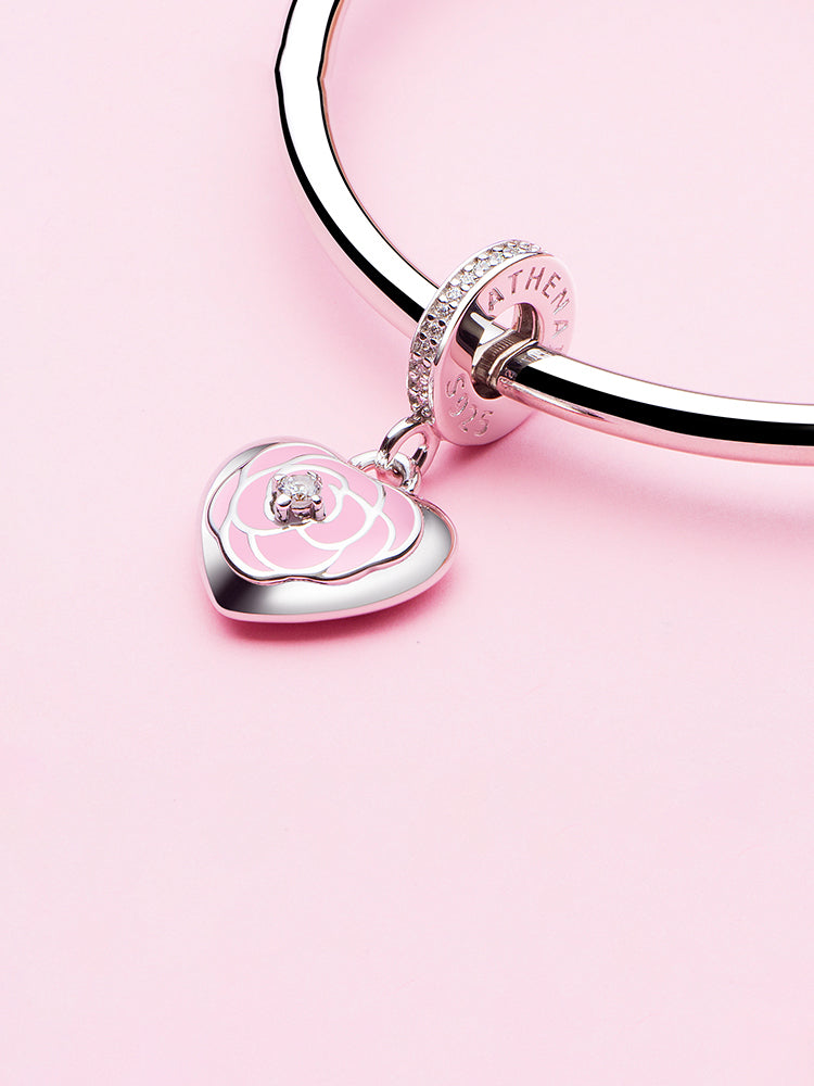 Pink rose heart dangle charm styled on bracelet