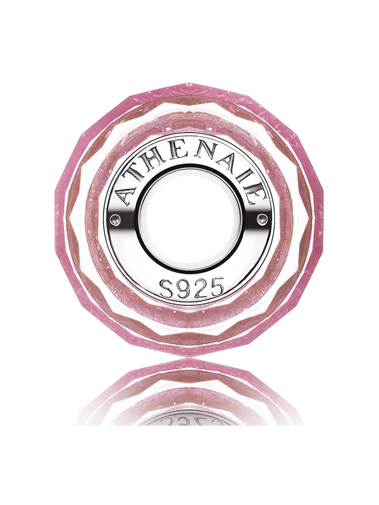 Side view of Pink Stardust Murano glass charm bead with sparkling pink design