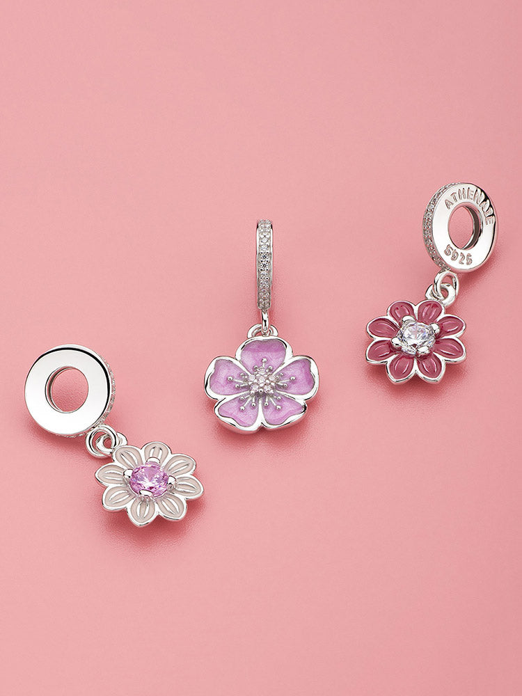 Floral charm bracelet styling with plum blossom charm pendant