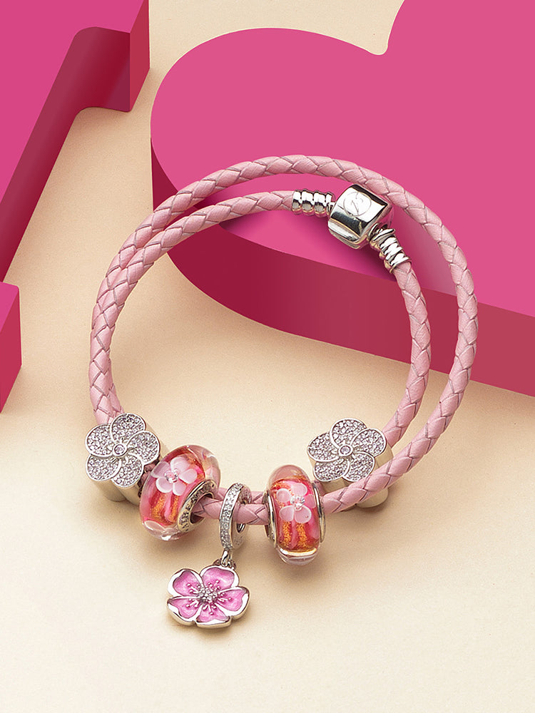 Sterling silver bracelet with plum blossom charm pendant