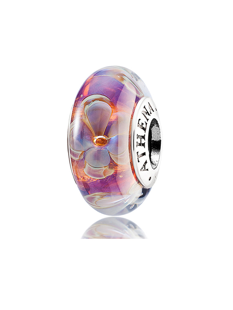 Purple and orange swirl Murano glass bead with a 925 silver core, front view