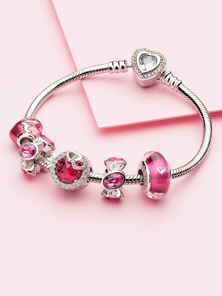 Radiant rose CZ charm bead paired with sterling silver charm bracelet