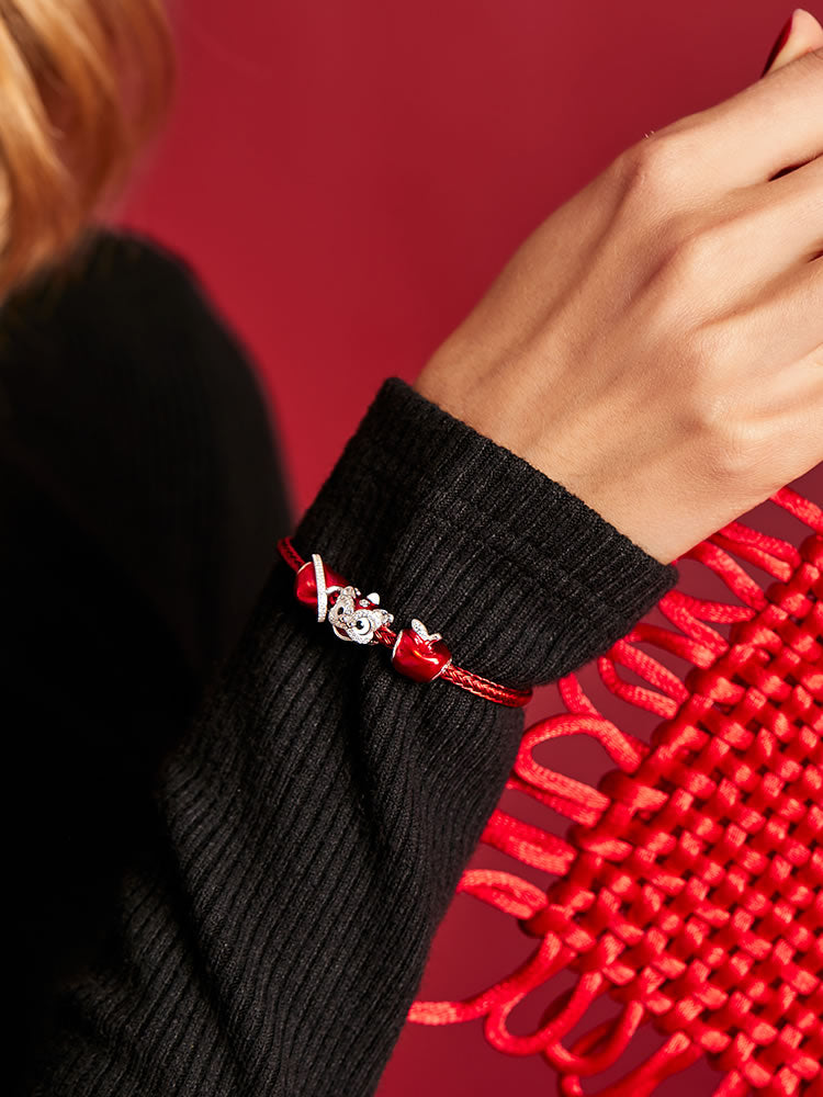 Red charm bracelet fashion styling with sterling silver heart clasp