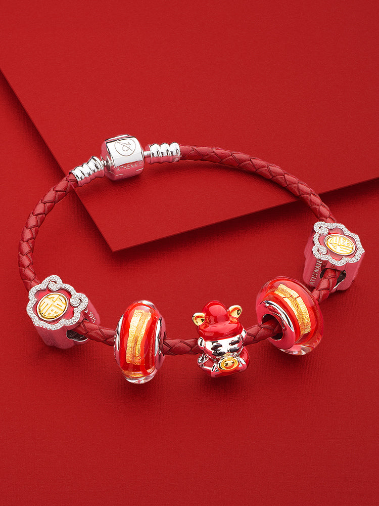 Red leather charm bracelet styled with charm beads
