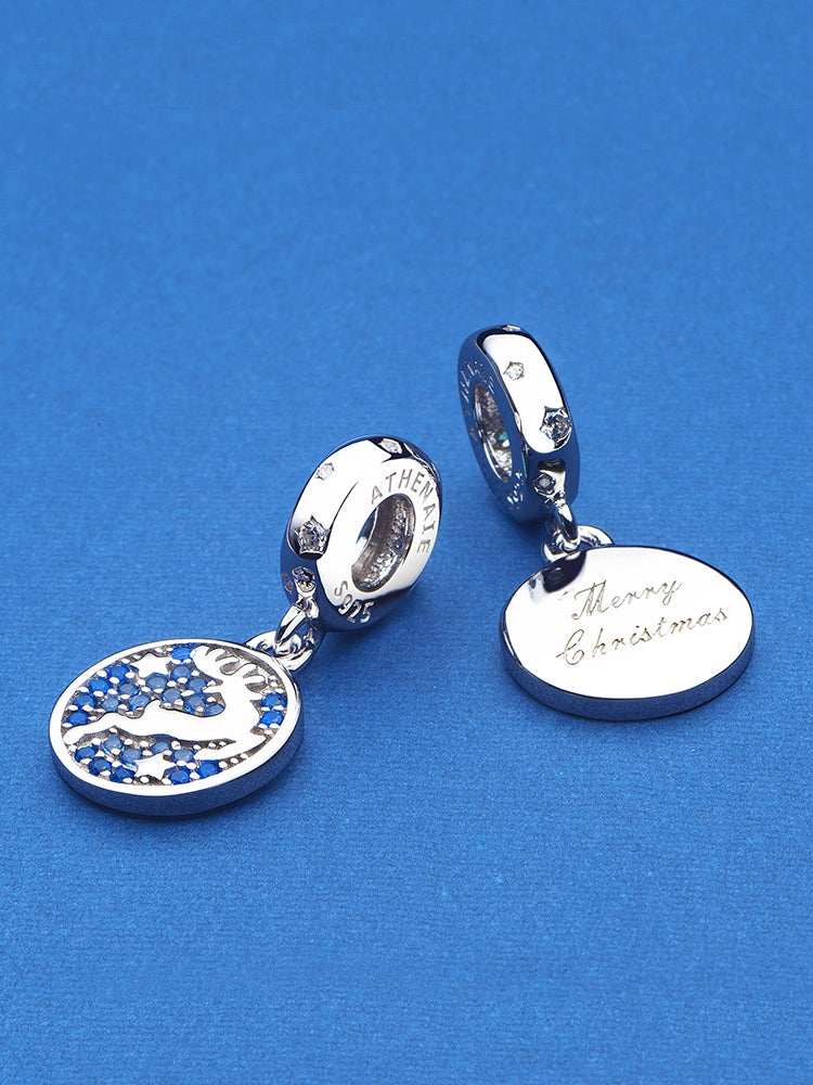 Winter reindeer pendant charm styled on charm bracelet