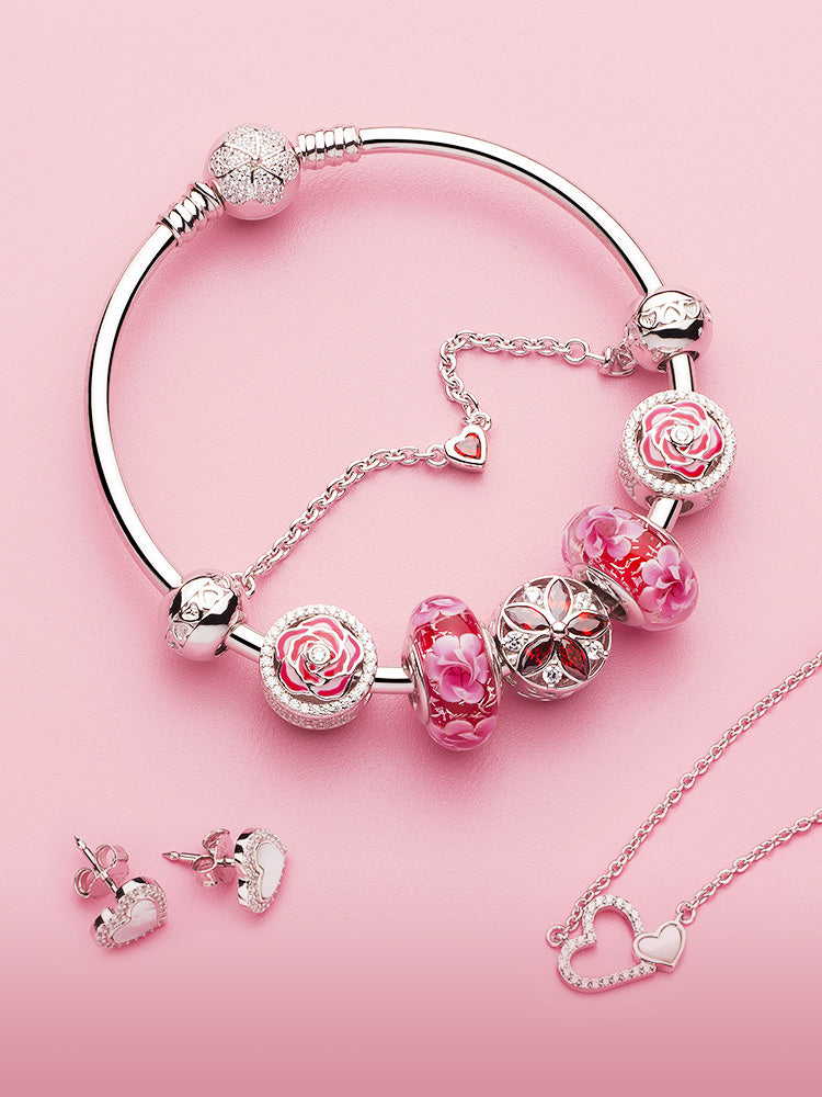 Rose charm bead bracelet styling with silver charms