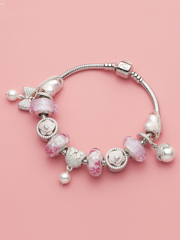 Blush rose charm bead bracelet styling with silver charms