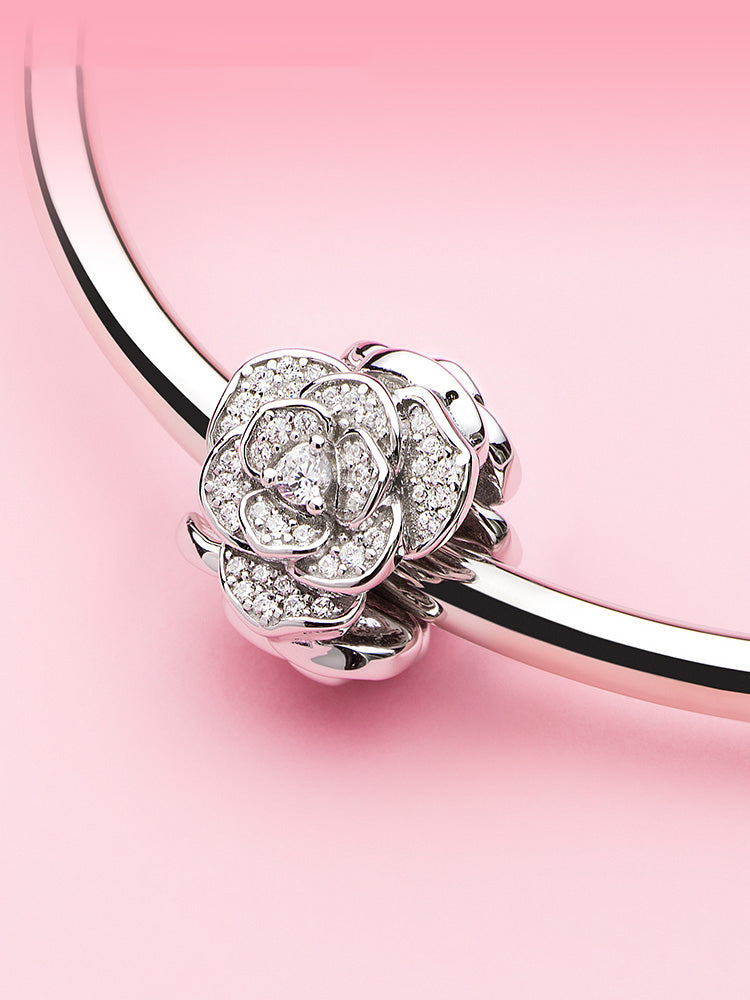 Rose Cluster charm bead displayed on silver charm bracelet