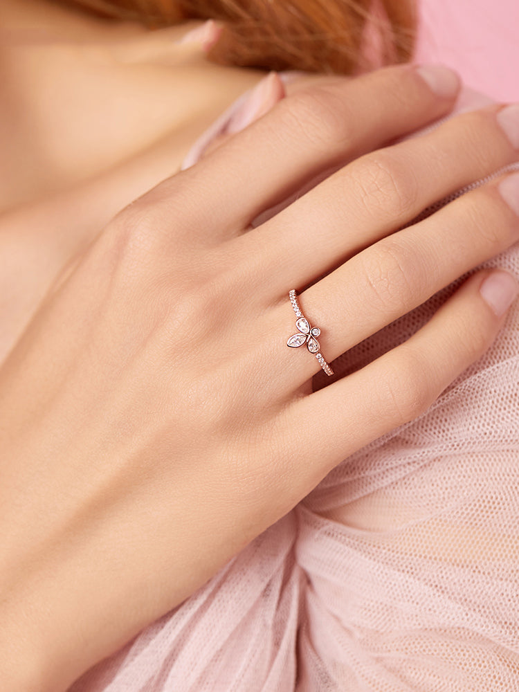 Rose gold marquise cluster ring on hand styling