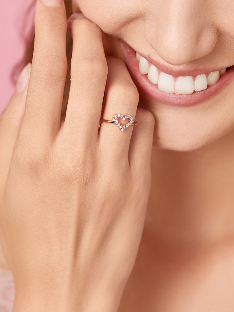 Rose gold open heart ring on hand styling