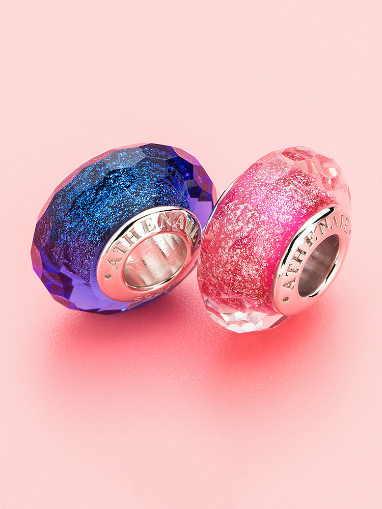 Close view of rose radiance murano glass charm on sterling silver bracelet