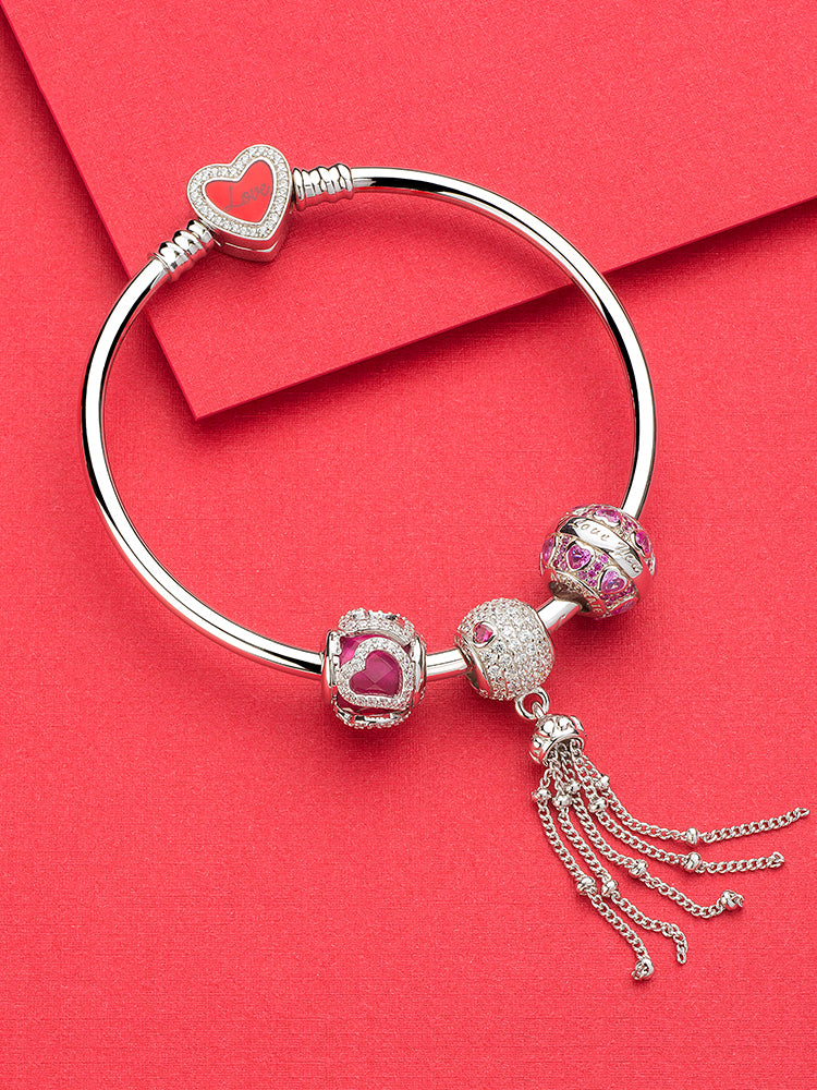Sterling silver bracelet styling with pink heart charm bead