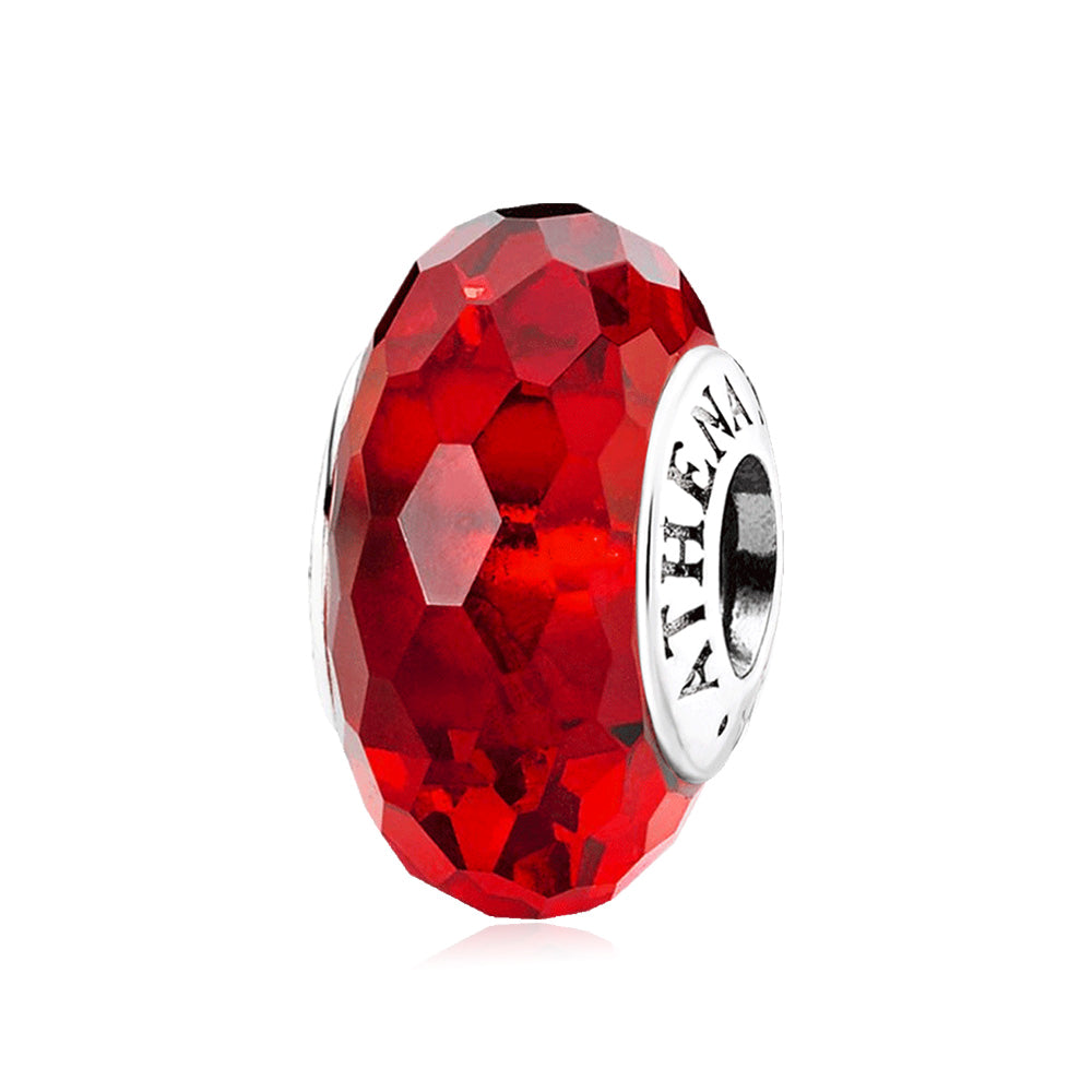 Front view of Ruby Gleam faceted Murano glass charm bead with 925 silver core, ruby red faceted glass design