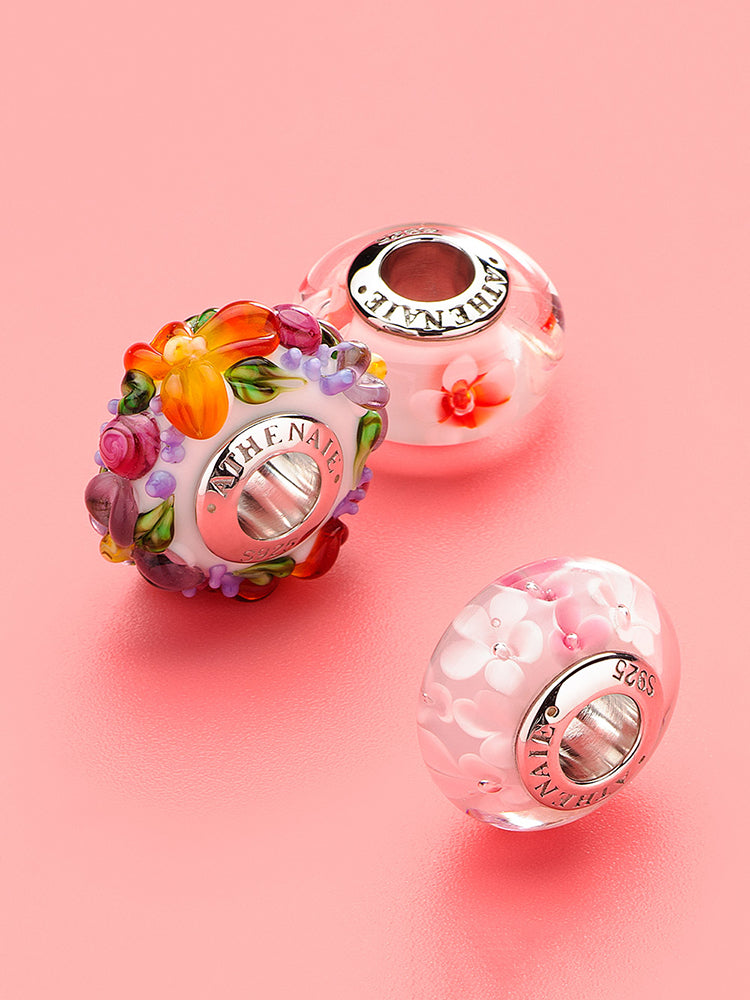 Sakura bloom murano glass charm on sterling silver bracelet