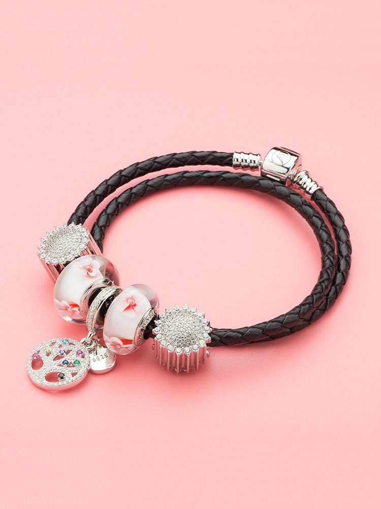 Sakura bloom murano glass charm paired with snake chain bracelet