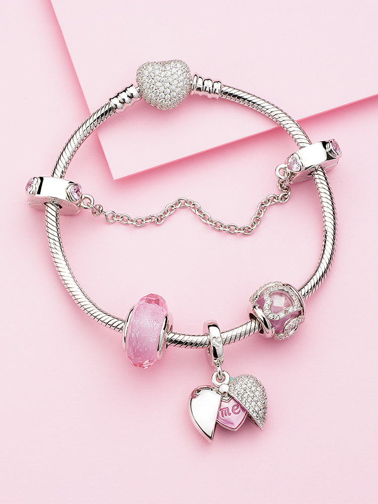 Complete bracelet look featuring a pink heart safety chain charm