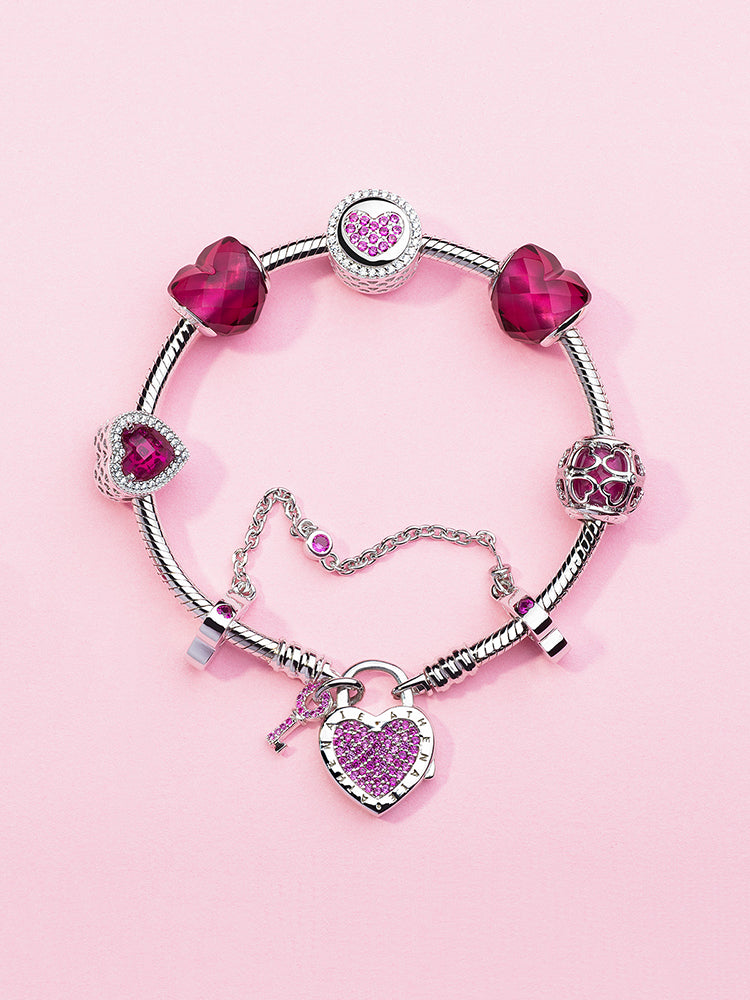 Silver bracelet styled with Crimson Four Leaf Clover charm bead
