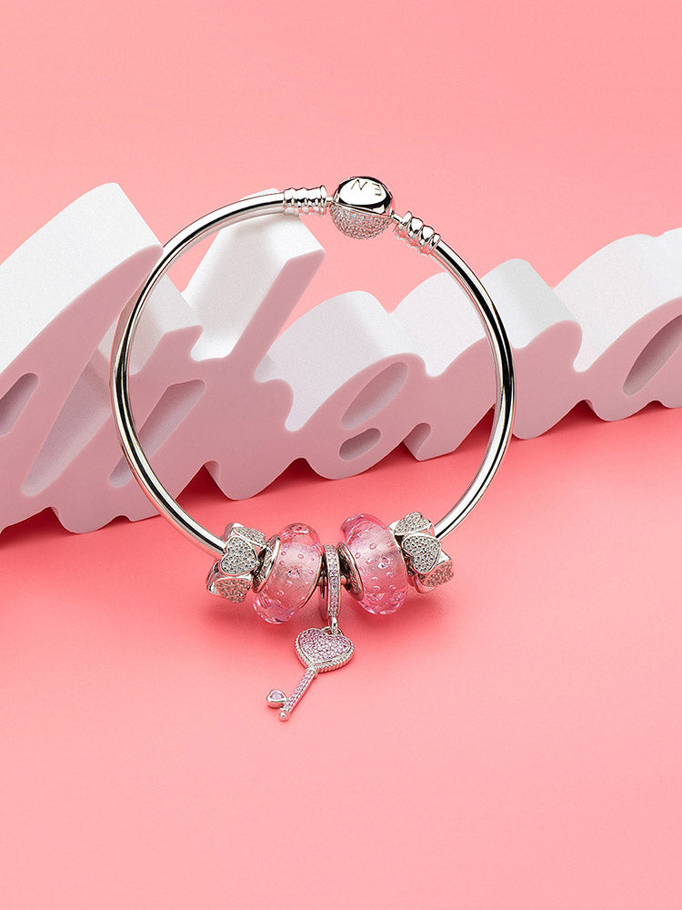 Silver heart charm bead bracelet detail