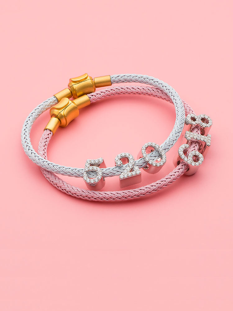 Sterling silver number charm bracelet styling