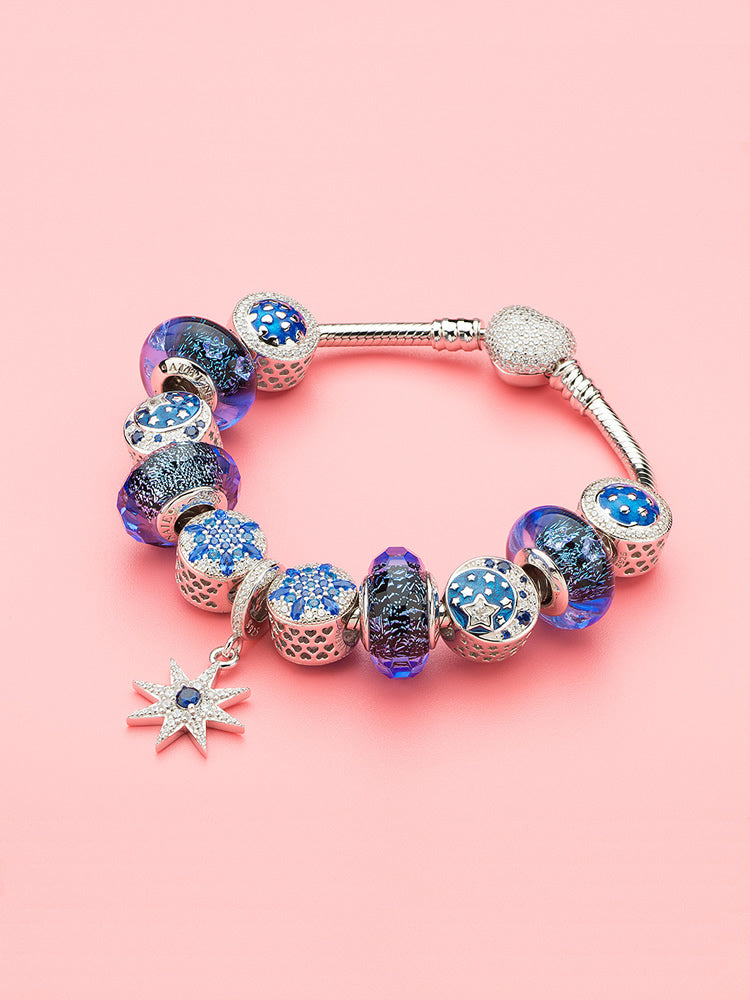 Silver snowflake charm bead bracelet styling by ATHENAIE