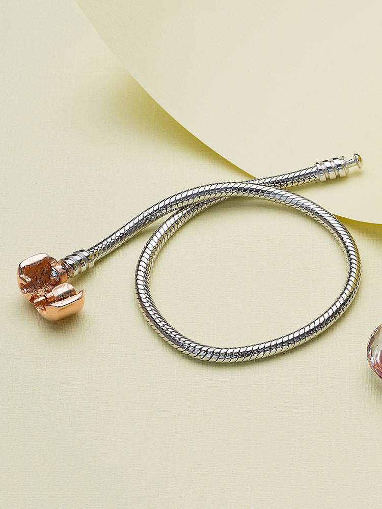 Classic sterling silver snake chain charm bracelet rose gold clasp detail