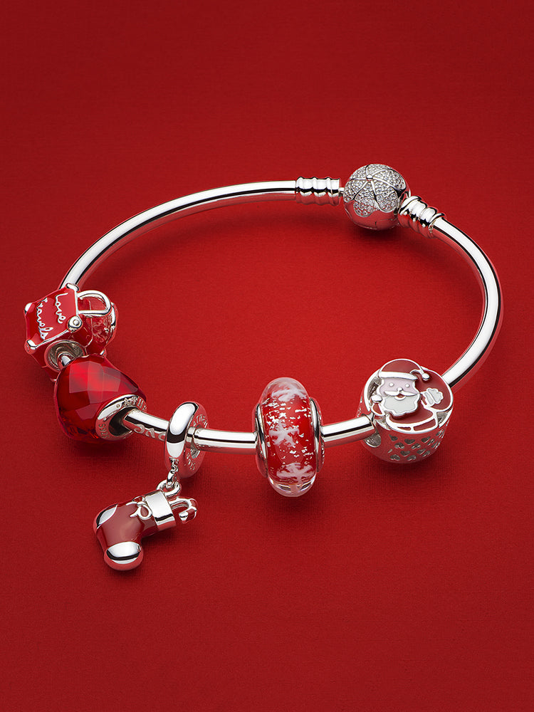 Snowfall Murano glass charm bead paired with charm bracelet