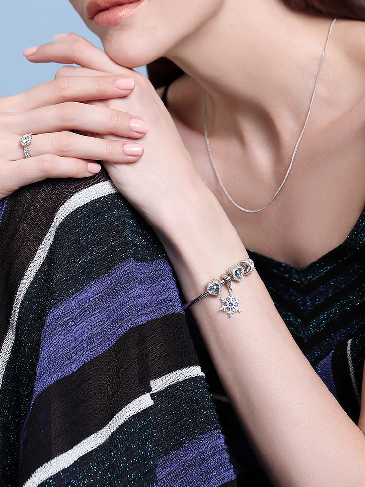 Blue snowflake charm bracelet model styling