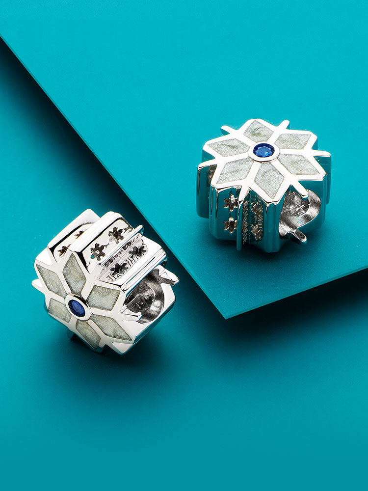 Snowflake enamel charm bead styled on European charm bracelet