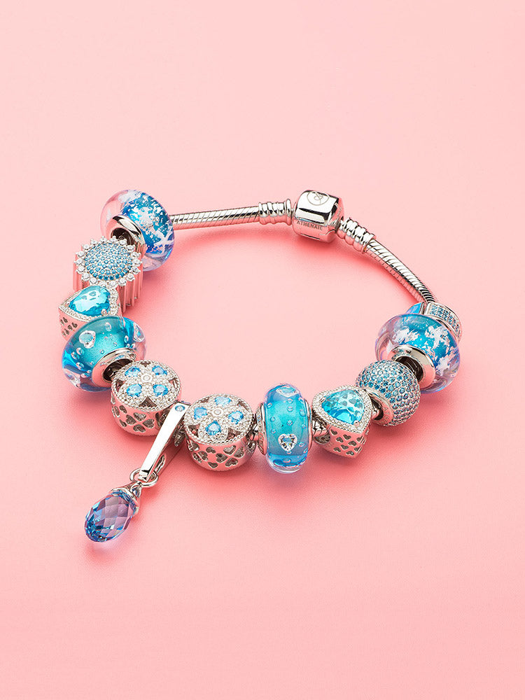 Handcrafted Murano glass snowflake charm bead on bracelet