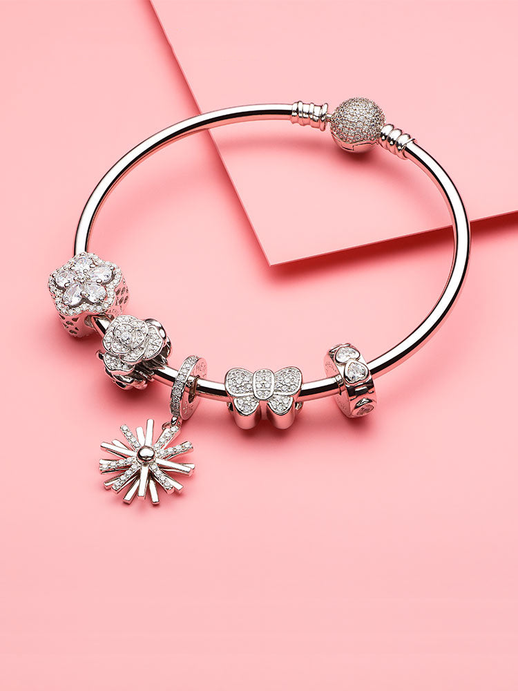 Sparkling Heart Clip Charm styled on sterling silver charm bracelet