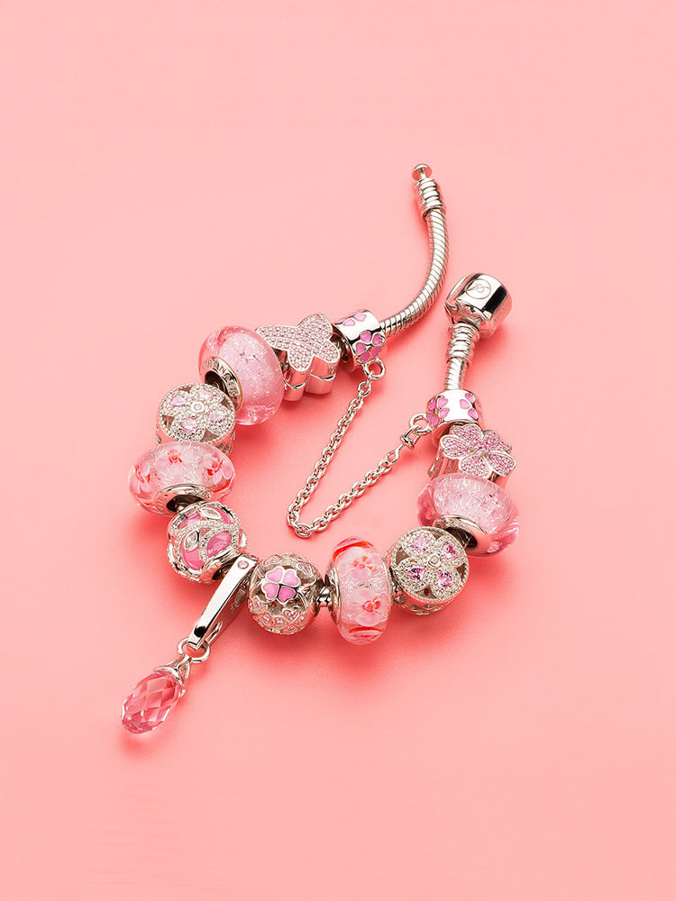 Pink crystal pendant charm paired with bracelet