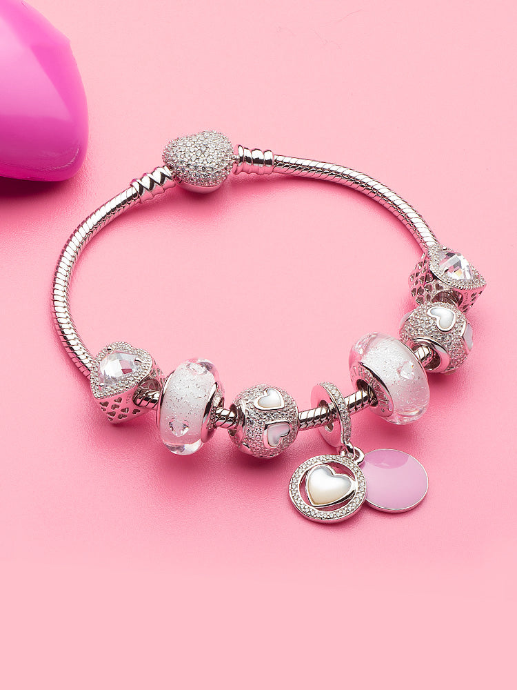 Heart dangle charm styled on bracelet