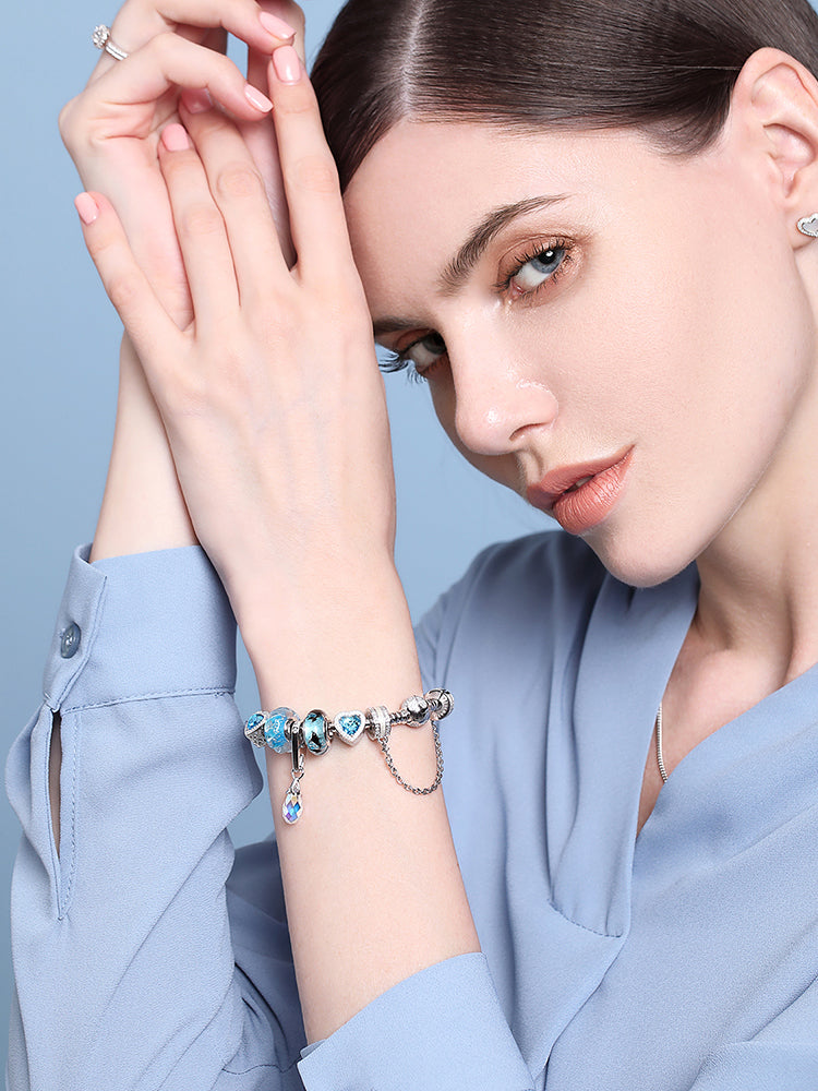 Aurora crystal dangle charm paired with bracelet