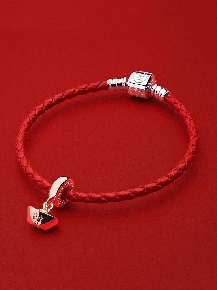 Rose gold Chinese ingot charm paired with bracelet
