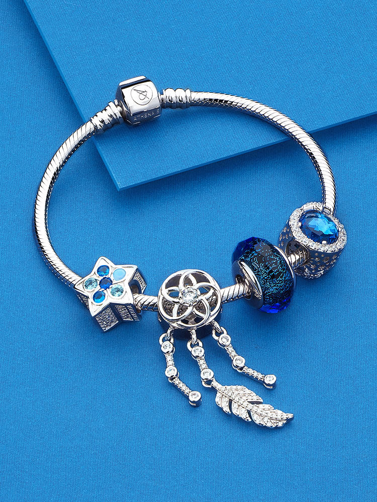 Blue star charm bead styled on charm bracelet