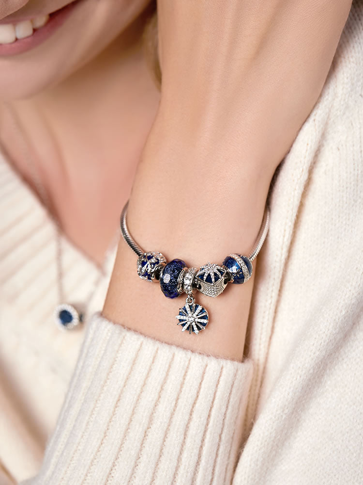 Blue starburst charm bracelet model styling