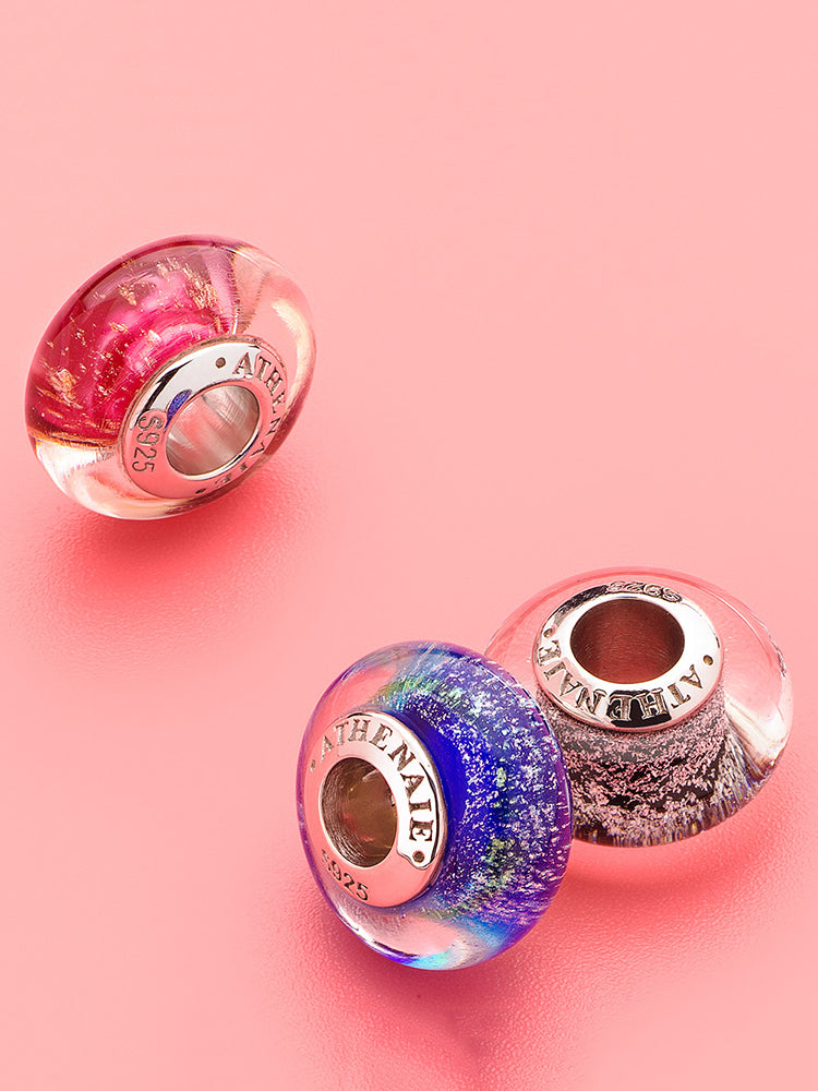 Stardust night murano glass charm styled on silver charm bracelet