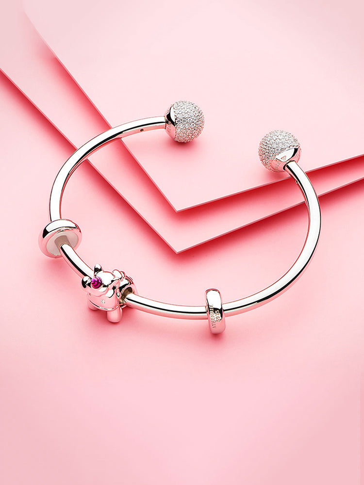 Stopper charm bead styled on charm bracelet by ATHENAIE