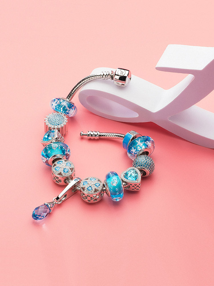 Sparkling sunflower charm bead on charm bracelet