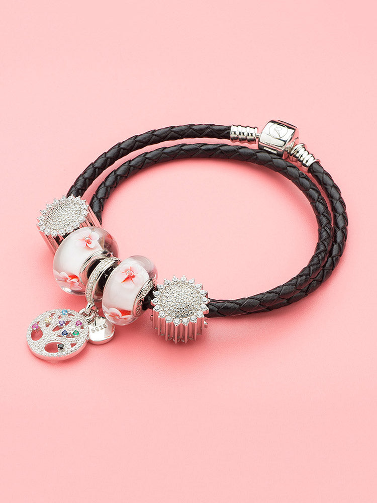 Sterling silver sunflower CZ charm bead paired with bracelet