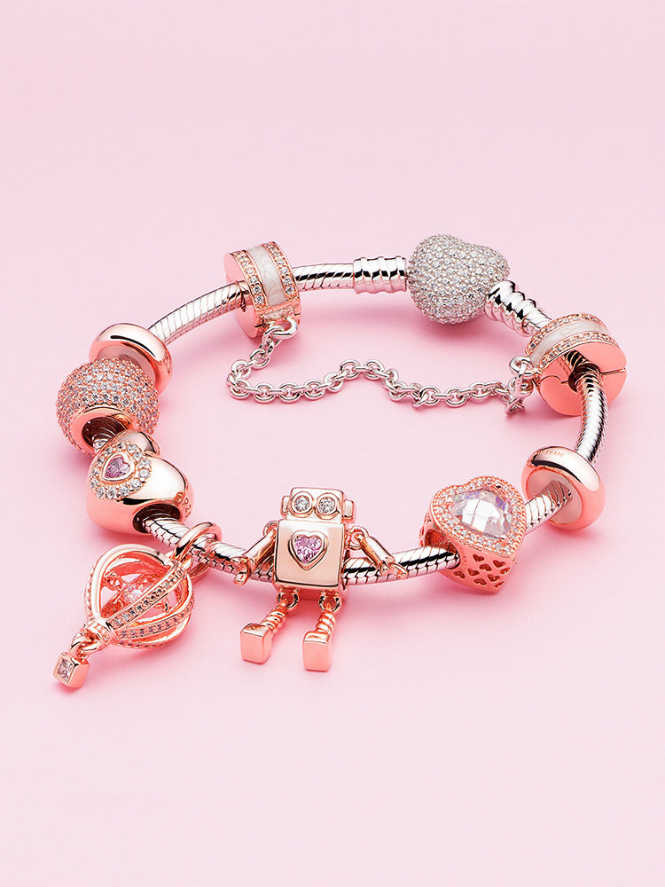 Travel pendant charm bracelet detail with shimmer voyage charm