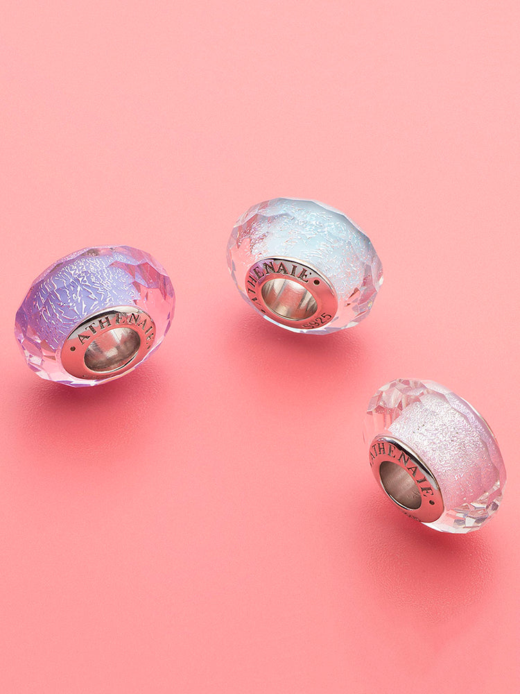 Twilight amethyst murano glass charm bead styled on sterling silver charm bracelet