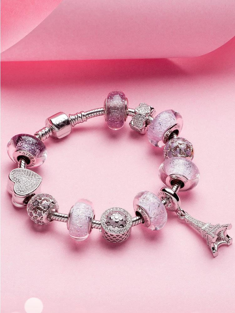 Twilight bloom murano glass charm styled on silver charm bracelet