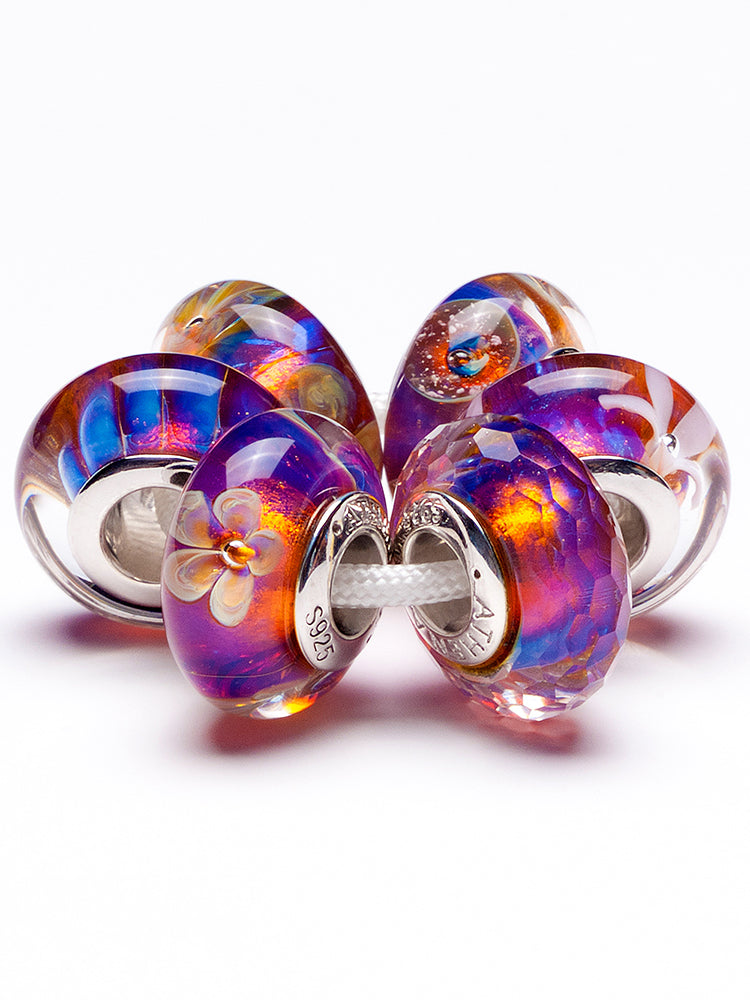 Close view of twilight veil murano glass charm on European charm bracelet