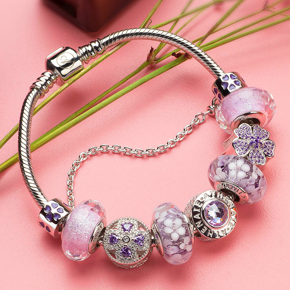 Violet Bloom charm bead combined with multicolor Murano beads on bracelet, vibrant and unique jewelry styling