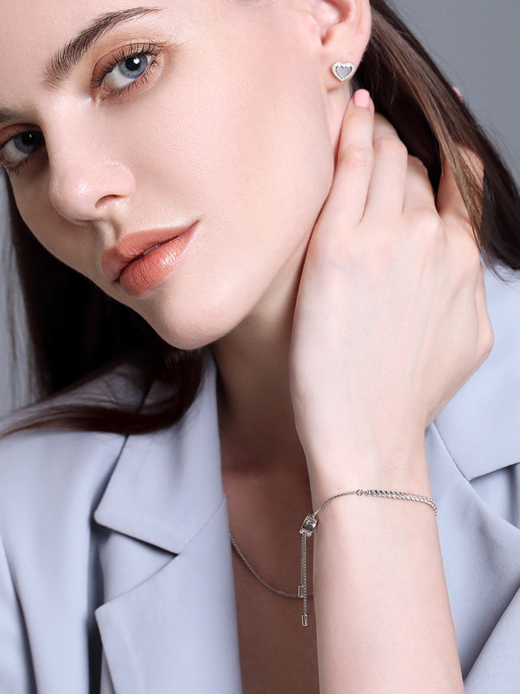 925 sterling silver adjustable charm bracelet with white CZ on wrist