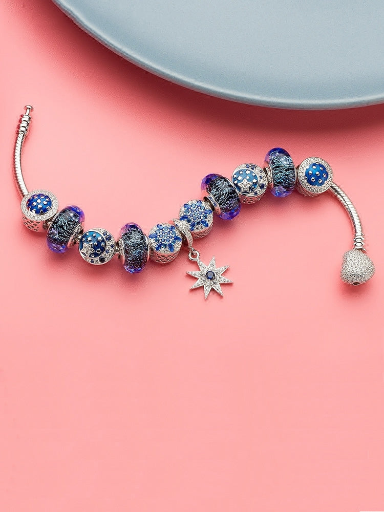 Winter snowflake charm bead styled with bracelet charms by ATHENAIE