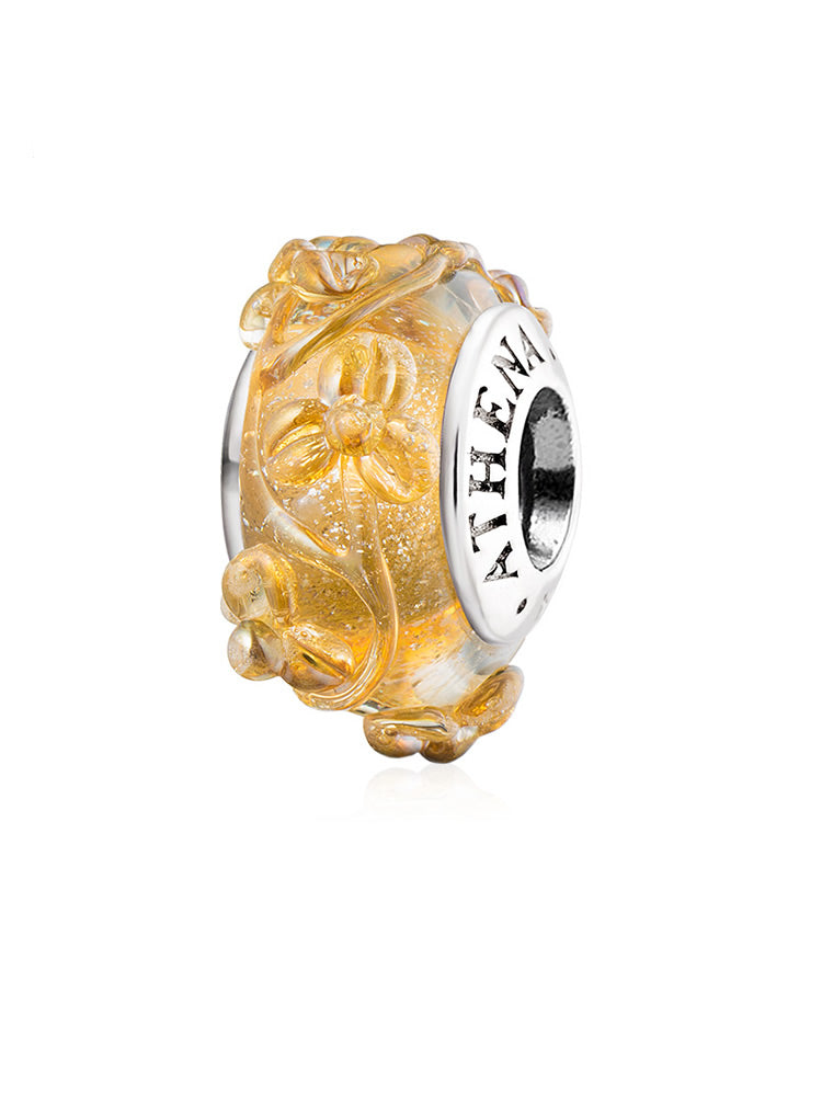 Yellow blossom Murano glass bead with a 925 silver core, front view